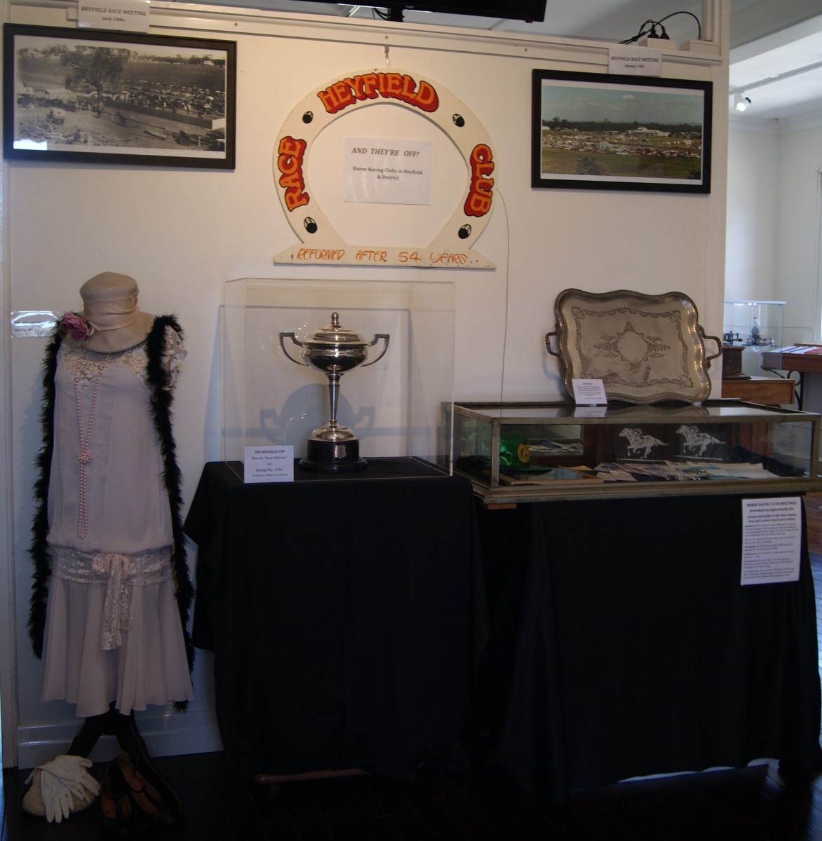 Heyfield Racecourse memorabilia including trophies, ladies racing attire and racecourse photos
