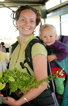 mother with baby and produce